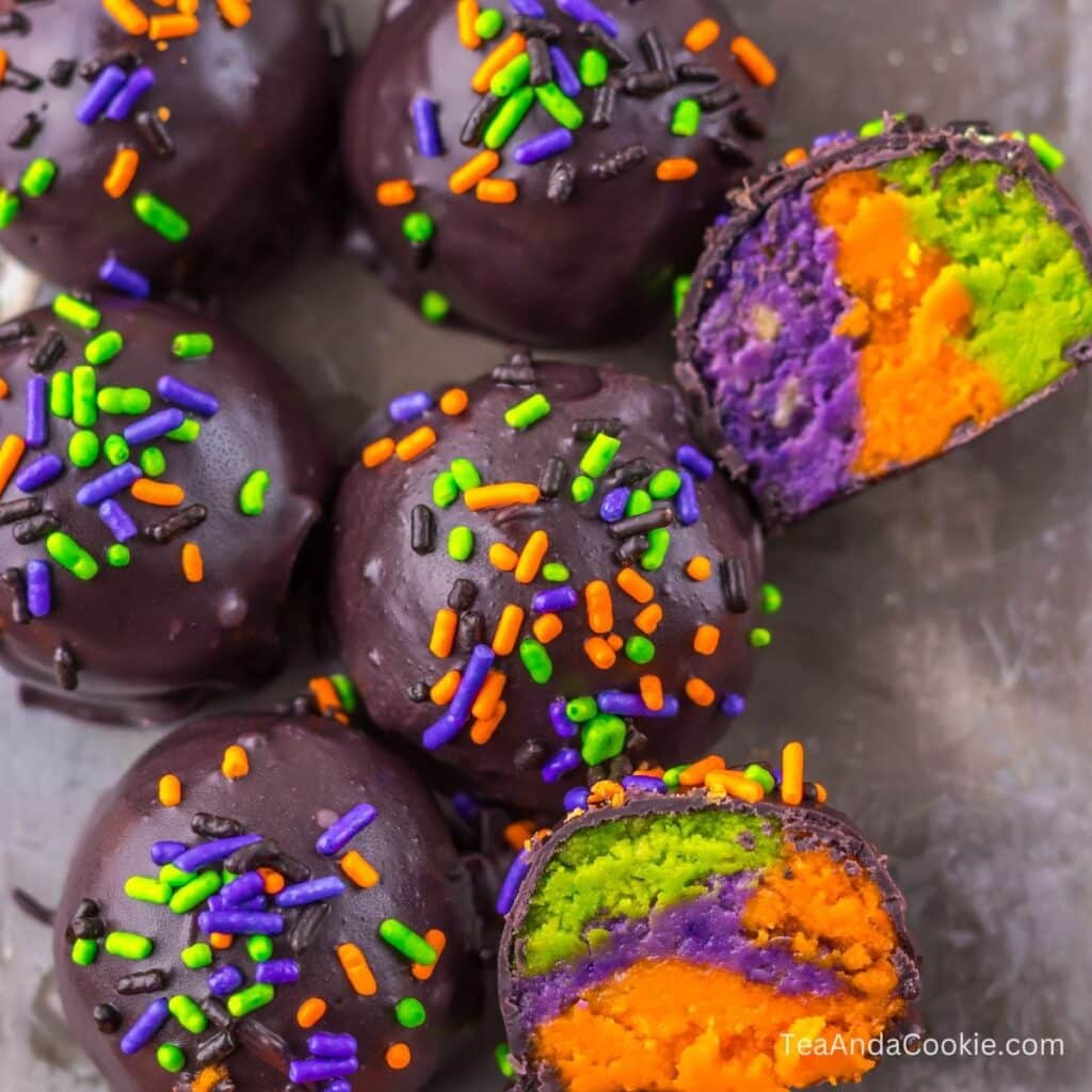 Colorful Halloween Oreo balls in orange, green, and purple