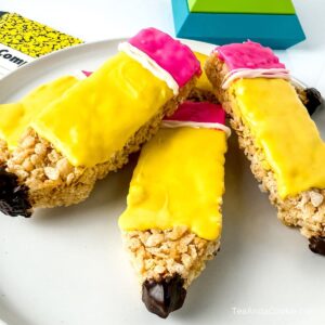 Pencil Rice Krispie treats with yellow and pink melted chocolate